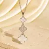 Nuevo Estilo Lujo Ligero Gama Alta Cadena de Suéter con Borla de Trébol de Cuatro Hojas, Elegante Joyería Clásica de Collar de Trébol de Alta Calidad para Mujeres
