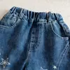 Calça Longa Infantil 2026 Outono Novidades Meninos e Meninas Patchwork Solta Jeans Estampado Bebê Estilo Coreano Calça Estrela
