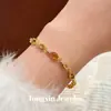 Nuevo brazalete de resina ovalada con circonita estilo chino, sensación de lujo ligero y alta gama, diseño único, moda nicho, exquisito accesorio para la mano