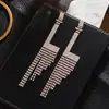 Novos brincos de franja longa com strass e letra do fabricante femininos emagrecedores totalmente cravejados de diamantes brincos de temperamento para casamento palco E788