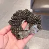 Elegante scrunchie para el pelo de lunares marrones con lazo de acetato, accesorio versátil para coleta, adorno para el pelo
