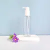 Em estoque Bomba de Loção com Interruptor Esquerdo e Direito Frasco de Plástico Branco Frasco Transparente com Bomba para Cosméticos Frasco Portátil Recarregável