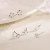 Pendientes de estrella de circón ultrabrillantes, pequeños, con orificios para las orejas y clavos en forma de hueso, exquisitos pendientes de pentagrama apilados.