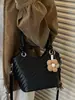 Bolsa de cubo de mano Shuai Mi Jia estilo coreano ins de moda para mujer, nuevo modelo de principios de otoño 2026, bolso de hombro simple y elegante, bolso de cubo