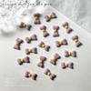 Nuevo mini lazo brillante para uñas, joyería luminosa de color, pequeño lazo, accesorios para uñas DIY.