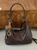 Tendencia minimalista transfronteriza otoño 2026 nuevo bolso de moda para mujer para el trabajo, bandolera cruzada casual personalizada