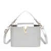 Bolso Retro de Nicho Transfronterizo para Mujer 2025 Nuevo Bolso Cubo Portátil Versátil de Alta Gama Bolso de Hombro Cruzado Plateado