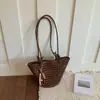 Bolsa de Palha Grande Capacidade Estilo Francês, Bolsa de Ombro Vazada de Luxo Leve, Design de Nicho, Textura de Alta Qualidade, Bolsa para Mãe e Filha para o Dia a Dia