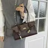 Bolsa de ombro estilo vintage, de alta qualidade, versátil, formato baguette, para mulheres, nova coleção 2026, simples e chique para o dia a dia, bolsa tote de ombro