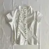 Estilo Novo de Verão Europeu e Americano Transfronteiriço Camisa de Cor Sólida com Botão Irregular com um Design Estiloso, Top de Manga Curta, Roupas Femininas Slim-Fit Atacado