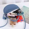 Bolso Nuevo de Primavera para Mujer, Bolso Redondo Pequeño Lindo, Bolso de Hombro Cruzado, Neceser Portátil, Bolso Pequeño al por Mayor de Comercio Exterior