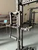 Rack de Agachamento Mt Tubo Quadrado 75 Acessórios Perna Lateral Extensão e Flexão Barra Acessórios Multifuncionais Diâmetro do Furo 26 Distância de 50 dos Outros