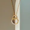 Artículo Popular Más Vendido Transfronterizo Europeo y Americano: Serie Mobius Anillo Doble Moda Versátil Gama Alta Diseño Personalizado Collar de Lujo Ligero