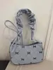 Versátil Bolso de Pana con Lazo para Mujer 2026 Nuevo Bolso de Hombro Único para Viajes Cotidianos Nicho Alta Apariencia Gran Capacidad Bolso de Mano