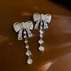 Nuevos pendientes de lujo europeos y americanos de alta gama con pedrería, pendientes largos de borla para mujer, pendientes de moda con lazo y diamantes