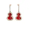 Pendientes de Calabaza Kirin Nuevos Chapados en Oro Rosa de 18k Pendientes Largos para Mujer Pendientes de Ónice Rojo Medianos Lujo Ligero