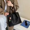 Elegante bolso de patrón tejido para mujer, nuevo bolso de hombro de moda 2026 para ir al trabajo, bolso tote tipo cubo vintage de otoño e invierno