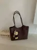 Bolso de mano simple de gran capacidad transfronterizo, textura versátil, bolsa tote, sensación de alta gama, nicho, apariencia retro, bolso de hombro único