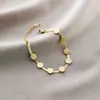 Pulsera de acero de titanio Jin Hui no se decolora cruzada popular femenina trébol de cinco hojas diamante estilo Ins personalidad chapado al vacío 18K