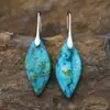 Nuevos pendientes colgantes de hojas de piedra natural bohemios europeos y americanos de moda, joyería retro de estación independiente transfronteriza.