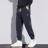 Colección de otoño para hombre transfronteriza nueva: pantalones de harén modernos, de corte holgado y bajo cónico, pants deportivos estilo americano, pantalones casuales largos