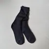 Calcetines nuevos para mujer de otoño e invierno, calcetines retro de color liso de doble aguja, calcetines de moda de seda dorada y plateada, hilo grueso, calcetines cómodos de rizo, calcetines de longitud media