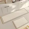 Alfombrilla especial para suelo de cocina japonesa 2024 nuevo estilo crema lodo de diatomeas antideslizante impermeable y a prueba de aceite alfombra larga