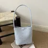 Bolso tote casual de gran capacidad para mujer, nuevo bolso de hombro de alta gama de moda primavera 2026 con diseño de lazo, bolso de axila
