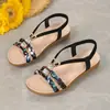 Comercio electrónico transfronterizo, talla grande, novedades 2026, sandalias de mujer en stock, punta redonda, diseño tejido, sandalias de moda para exteriores, sandalias planas de mujer