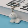 Lindo llavero colgante de cachorro tridimensional de dibujos animados resina flocado colgante de llavero de coche colgante de bolsa venta al por mayor