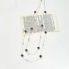Nl-128 Collar de Trébol de Cuatro Hojas de Goteo de Aceite de Doble Capa Apilado Largo Moda Versátil Cadena para Suéter Accesorios de Otoño e Invierno Venta al por Mayor