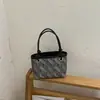 Bolsa de balde de nicho de alta qualidade para mulheres, nova bolsa versátil de outono de 2026, bolsa transversal popular para ir ao trabalho