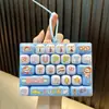 Llavero colgante de teclado de 26 teclas, juguete antiestrés para estudiantes, decoración divertida para bolsa, interesante regalo pequeño al por mayor
