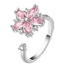 Tiktok hora de transportar Anillo giratorio de flor de cerezo Diamante Rosa Índice de chica popular en internet Moda personalidad Joyería de salto disco