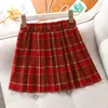 Suéter Falda Estilo Universitario Navideño y de Año Nuevo para Niñas, Falda Corta Plisada de Punto Rojo Otoño e Invierno Nueva para Niñas Mayores
