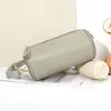 Bolso de hombro de cuero de vaca de capa superior de alta gama para mujer, diseño de moda de nicho, bolso cilíndrico, versátil para ir al trabajo, bolso cruzado casual