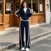 Conjunto de dos piezas para mujer: chaqueta a rayas con capucha y cremallera de estilo deportivo casual + pantalones largos anchos con cordón