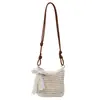 Bolso de mano tejido hueco transfronterizo, bolso cuadrado pequeño con un ambiente relajado, perfecto para vacaciones en la playa, bolso cruzado para teléfono, bolso de paja con temática de bosque