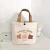 Bolsa de Lona Estilo Urso Nova para Mulheres, Estampada, Versátil, Portátil para Estudantes, Adequada para o Trabalho, Bolsa de Almoço, Bolsa de Mão, Bolsa Tote de Lona
