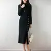Suéter 100% Lana Pura para Mujer Cuello Alto Medio Tejido Vestido de Manga Larga Otoño e Invierno Nuevo Estilo Moderno y Tendencia Botones Laterales