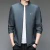 Chaqueta de negocios casual para hombre con cuello mao, nueva colección otoño 2026, prenda exterior versátil, simple y de alta gama