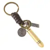 Llavero de cuero con forma de bala único, etiqueta de aleación vintage desgastada, accesorio para hombre, pequeño adorno para pareja