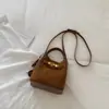 Bolso de mano retro, de color liso, de nicho, moderno para mujer, nuevo bolso cruzado casual y elegante 2026, bolso tipo cubo tote relajado