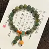Pulseira de raiz de bodhi verde-tinta para mulheres, novo estilo chinês, ornamento de lótus de mão, macia e flexível para brincar com os dedos, pulseira de contas budistas