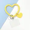 Amazon Mismo Estilo Simple Anticaídas Antiperdida Multifunción Colgante Redondo/Cuadrado Pulsera de Silicona Colgante para Teléfono Móvil