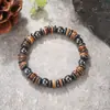 Popular pulsera bohemia de nuevo estilo europeo y americano con piedra iridiscente moteada y cuentas de concha de coco, pulsera de cuentas vintage unisex