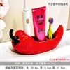 Al por mayor Creativo Cerámica de Chile Pimiento Soporte Eléctrico para Cepillo de Dientes y Pasta de Dientes, Estante de Almacenamiento para Lavabo, Soporte para Cepillo de Dientes de Baño