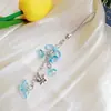 Glase Creativo Orquídea Cadena Lazo Hueco Mariposa Accesorios Metálicos Bolsa para Auriculares Llavero Decorativo Colgante