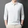 Nueva colección de primavera y otoño: Camiseta de manga larga holgada, ligera y elegante para hombre, de color liso y con un cuello polo clásico, adecuada para hombres de mediana edad en entornos de negocios casual.