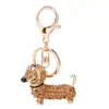 Europa y Estados Unidos Nueva Fábrica de Joyería Directo al Consumidor deseo AliExpress popular strass dachshund perro salchicha llavero al por mayor